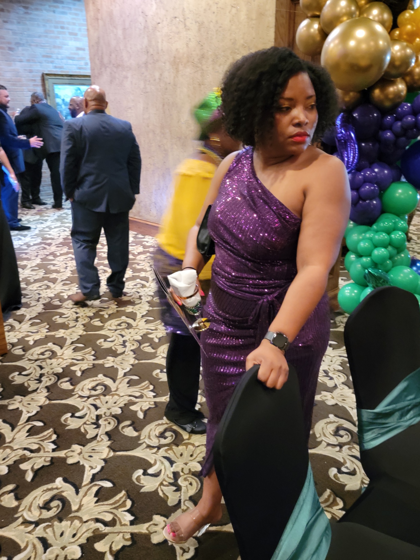 Attendee in sequined gown
