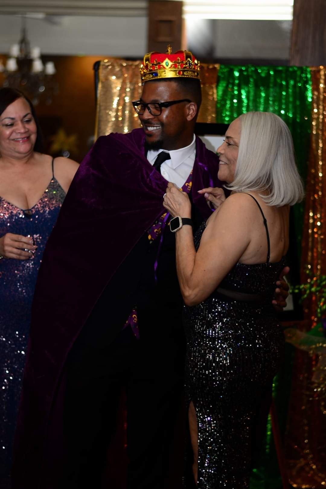 Mardi Gras King being robed